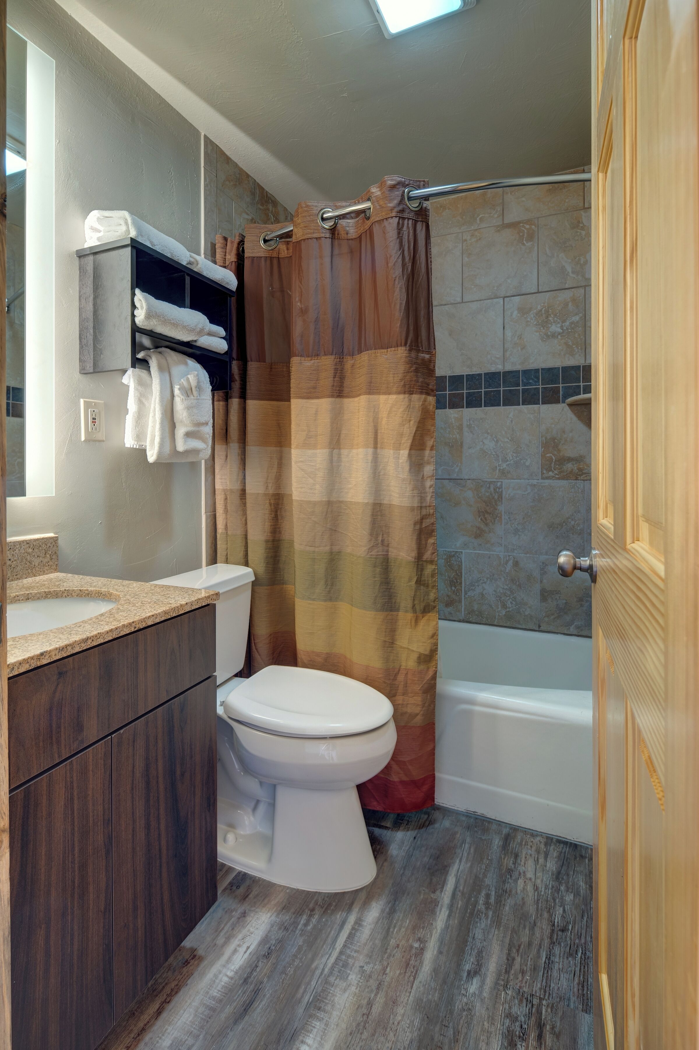 signature room, 2 queen beds, refrigerator & microwave, park view | bathroom | combined shower/bathtub, free toiletries, hair dryer, towels