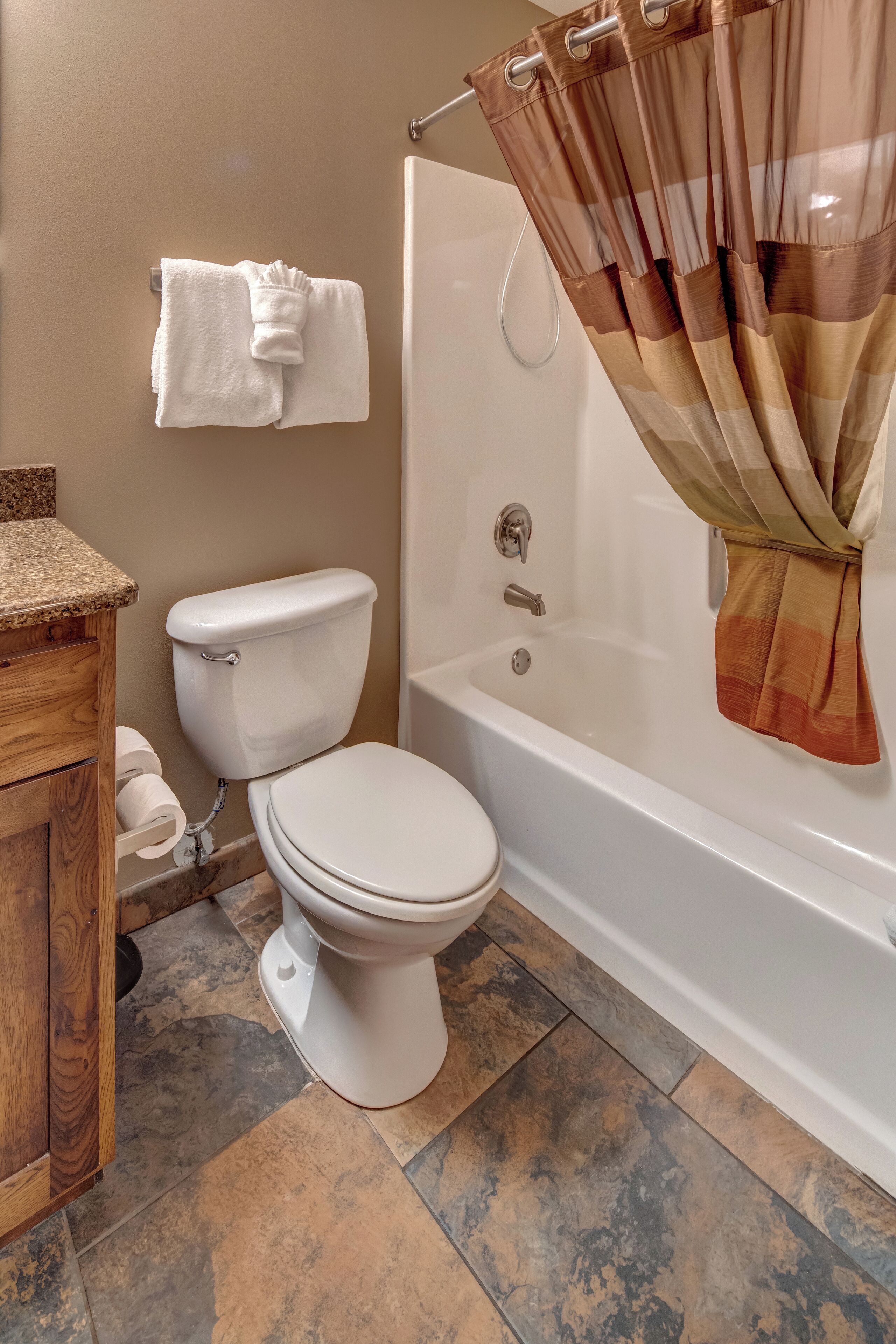 combined shower/bathtub, free toiletries, hair dryer, towels