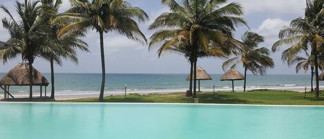 Outdoor pool, pool umbrellas, sun loungers