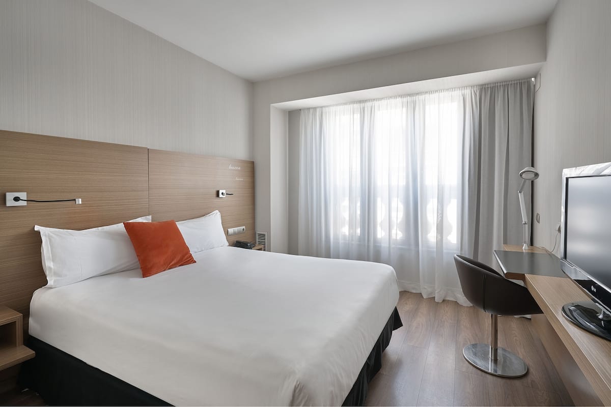 Ropa de cama de alta calidad, edredón y minibar