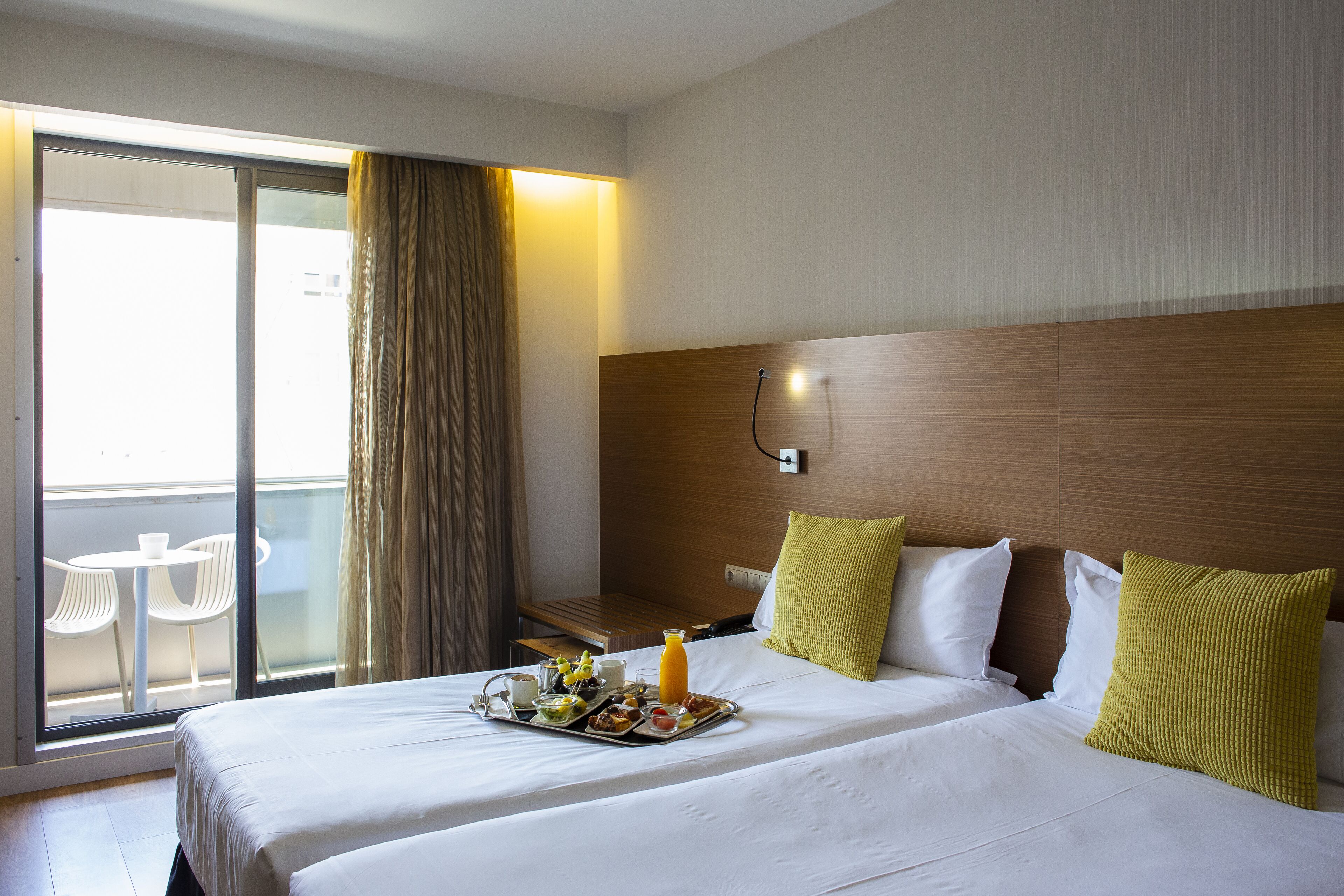 premium bedding, down duvets, minibar, in-room safe