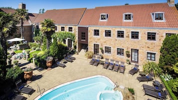 Outdoor pool, pool umbrellas, pool loungers