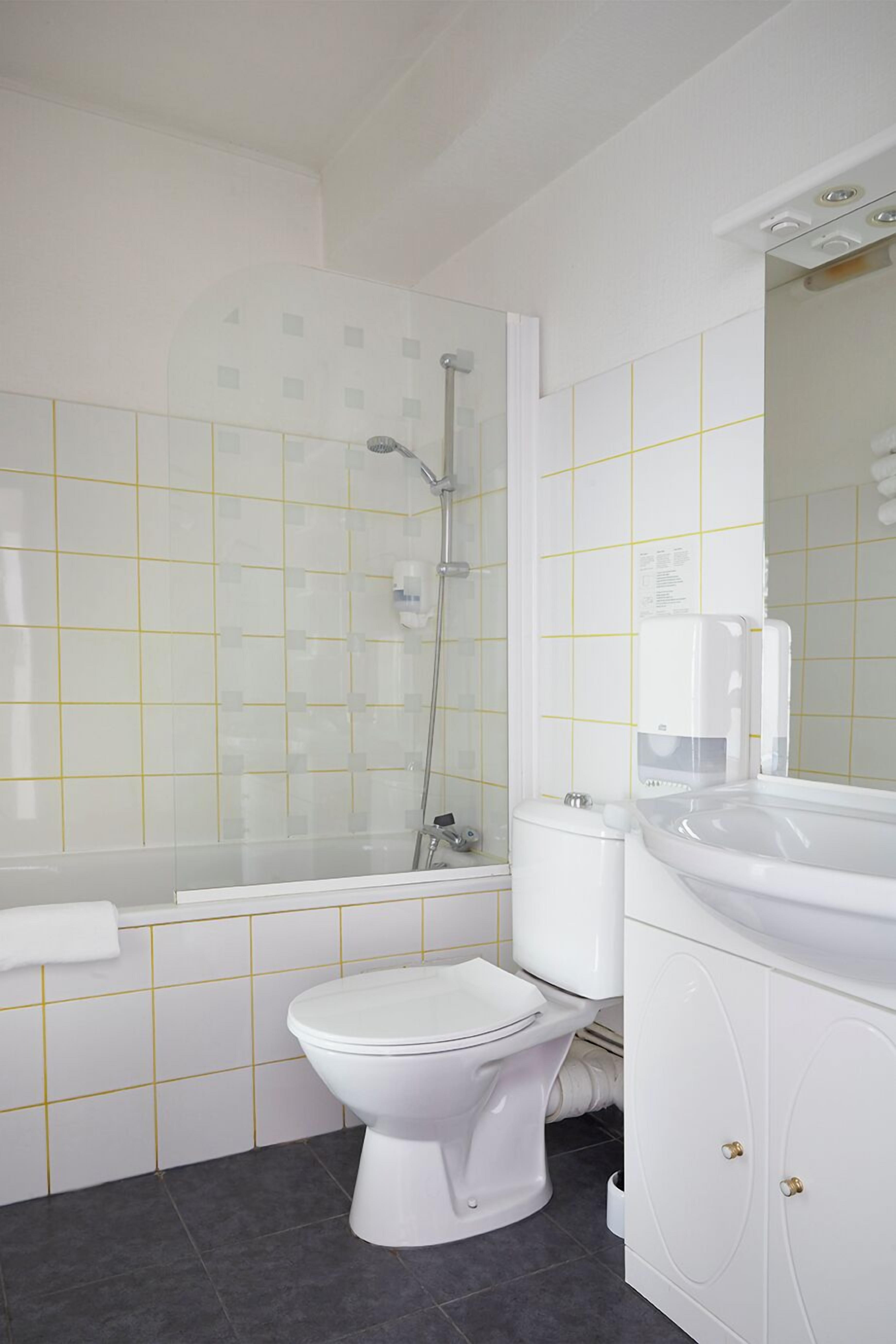 free toiletries, hair dryer, towels, toilet paper