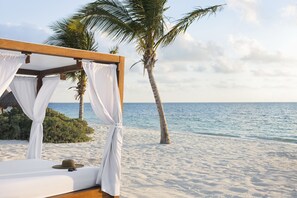 Een privéstrand, massages op het strand, duiken, snorkelen