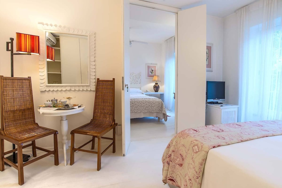 Junior Suite, 2 Bedrooms, Garden View | 2 bedrooms, hypo-allergenic bedding, memory foam beds, minibar