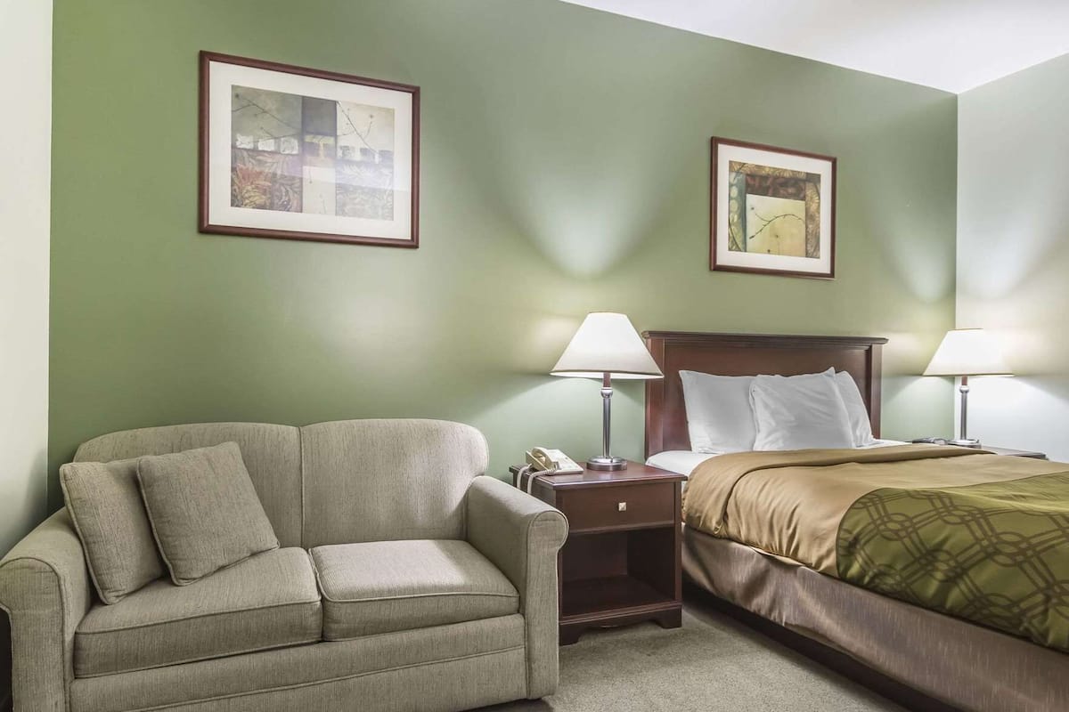 Select Comfort beds, desk, blackout drapes, iron/ironing board