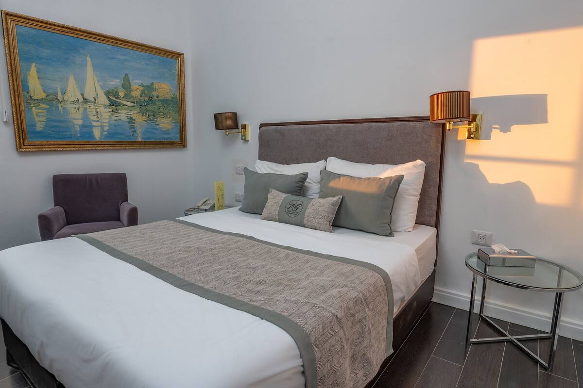 Classic Double Room | Minibar, in-room safe, desk, iron/ironing board (on request)