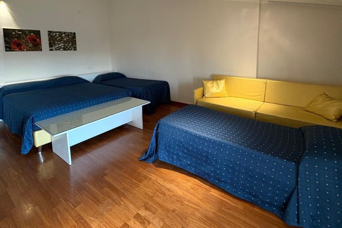 Quadruple Room | Minibar, in-room safe, desk, free WiFi