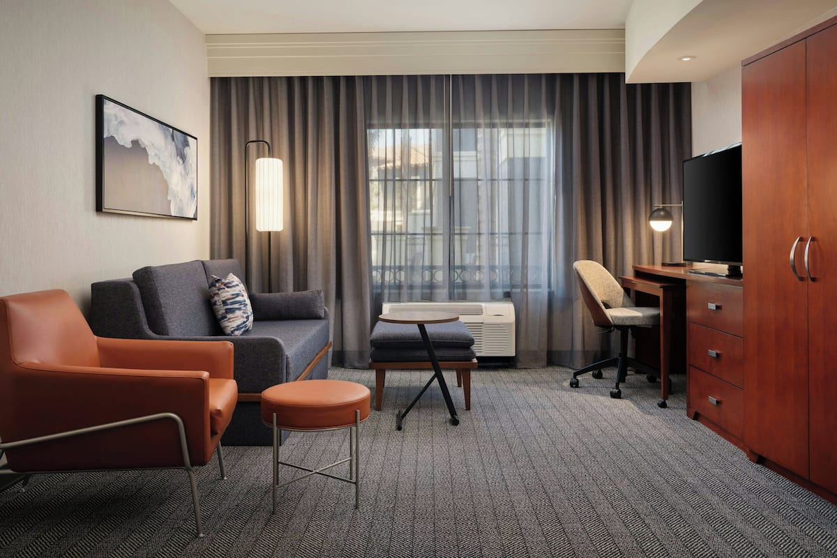 Suite, 1 Bedroom | Living room | LCD TV, pay movies