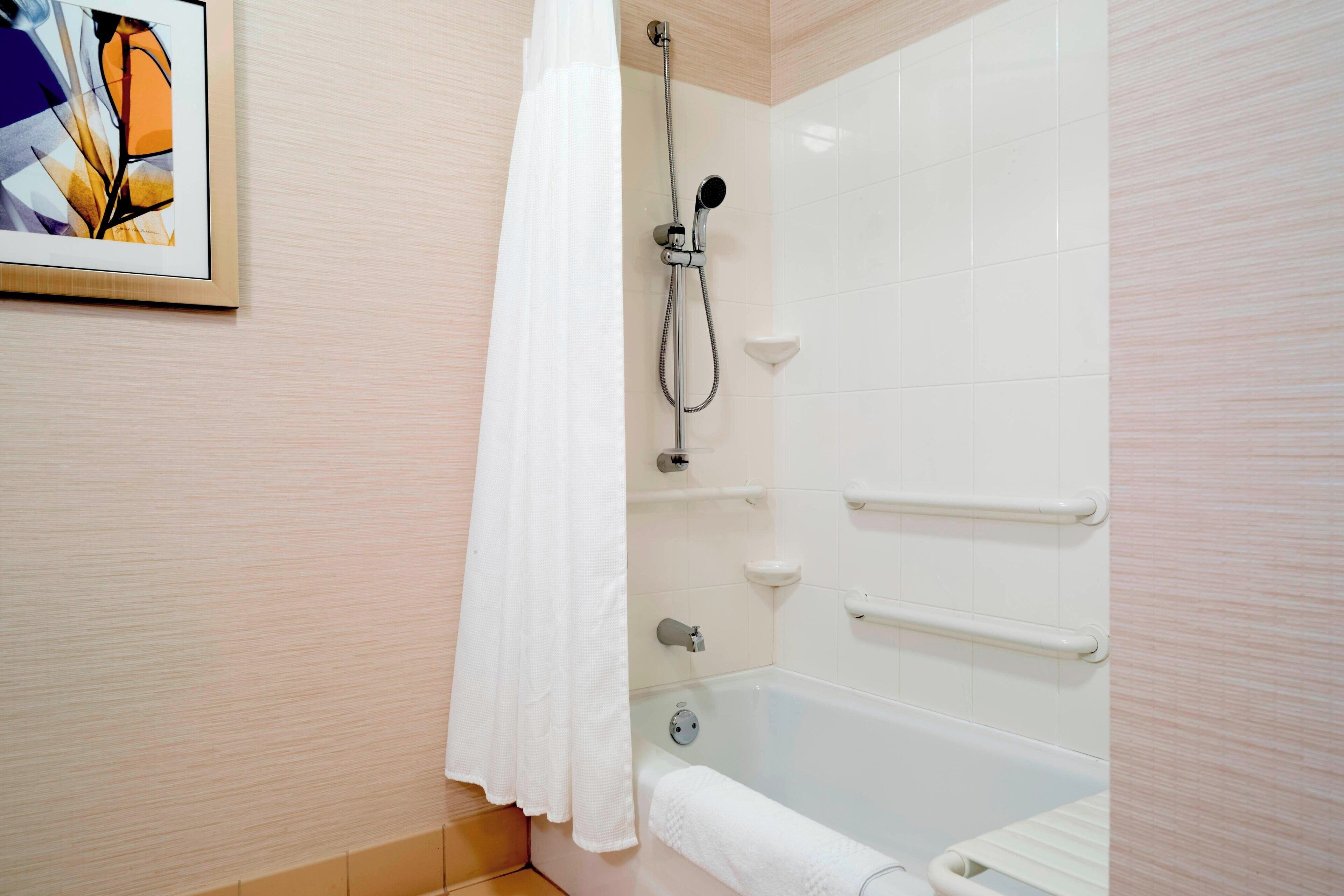combined shower/bathtub, free toiletries, hair dryer, towels