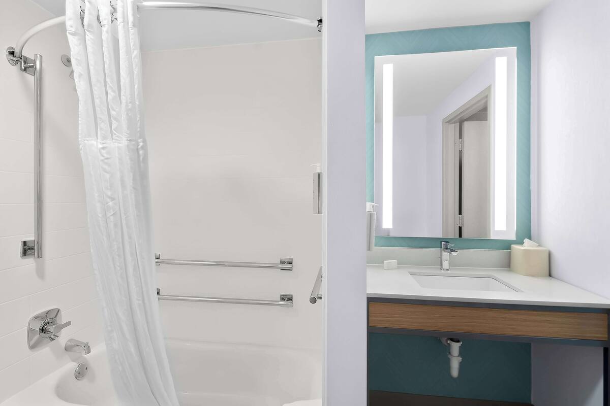 room, 2 queen beds, accessible, bathtub (hearing impaired) | bathroom | designer toiletries, hair dryer, towels, soap