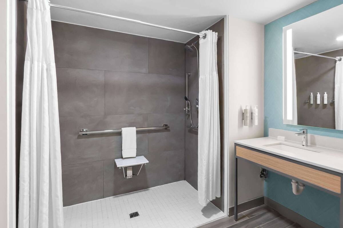 suite, 1 king bed, accessible, non smoking (hearing impaired) | bathroom shower