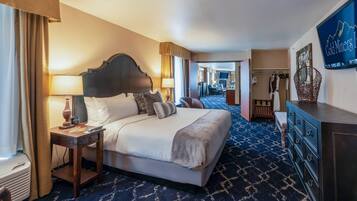 Desk, laptop workspace, blackout curtains, iron/ironing board