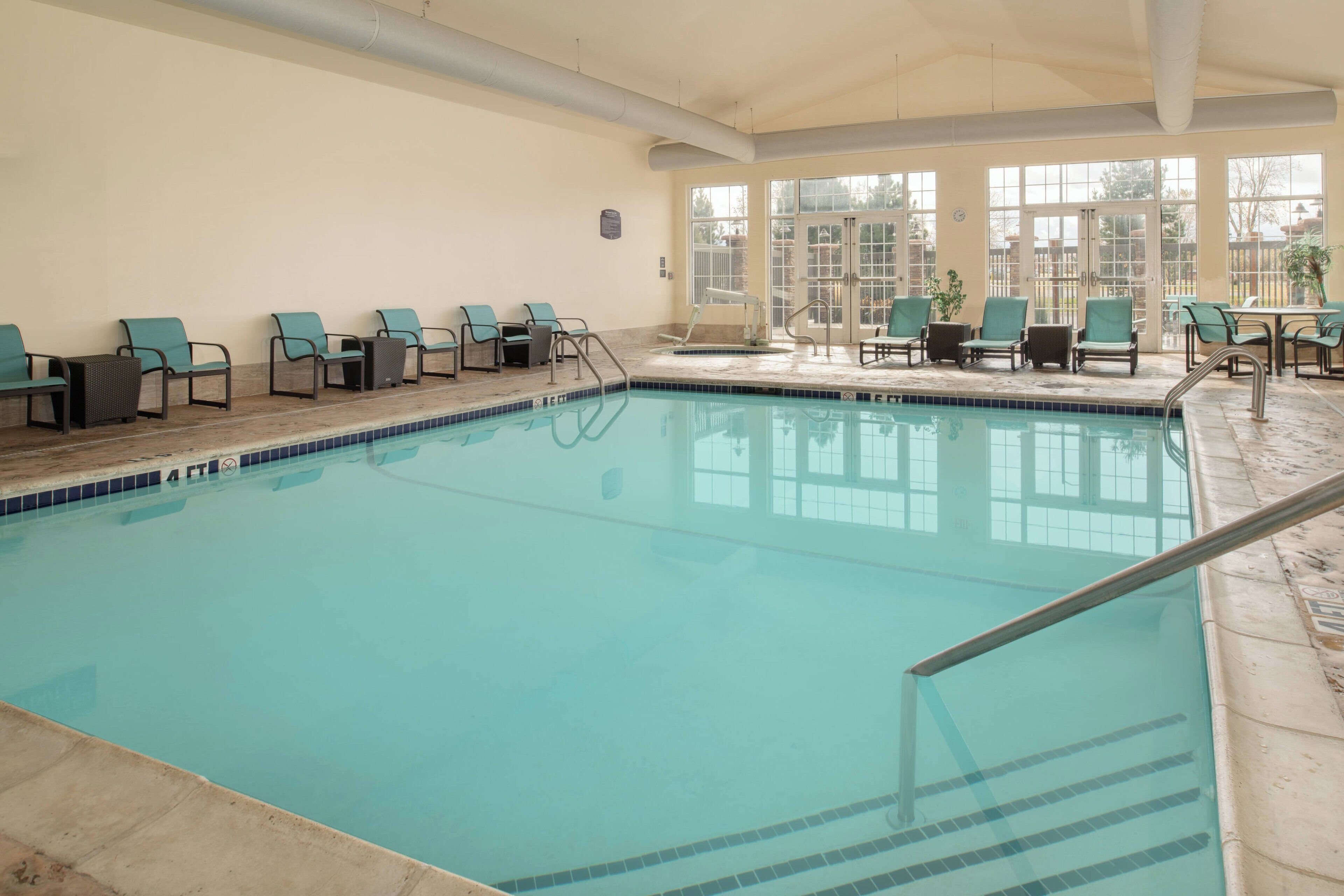 indoor pool, open 6:00 am to 10 pm, pool loungers