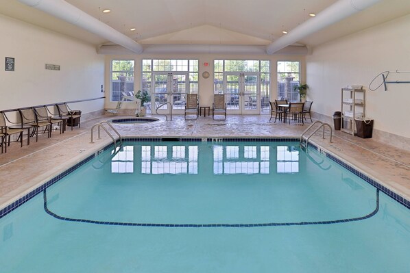 Indoor pool, open 6:00 AM to 10 PM, pool loungers