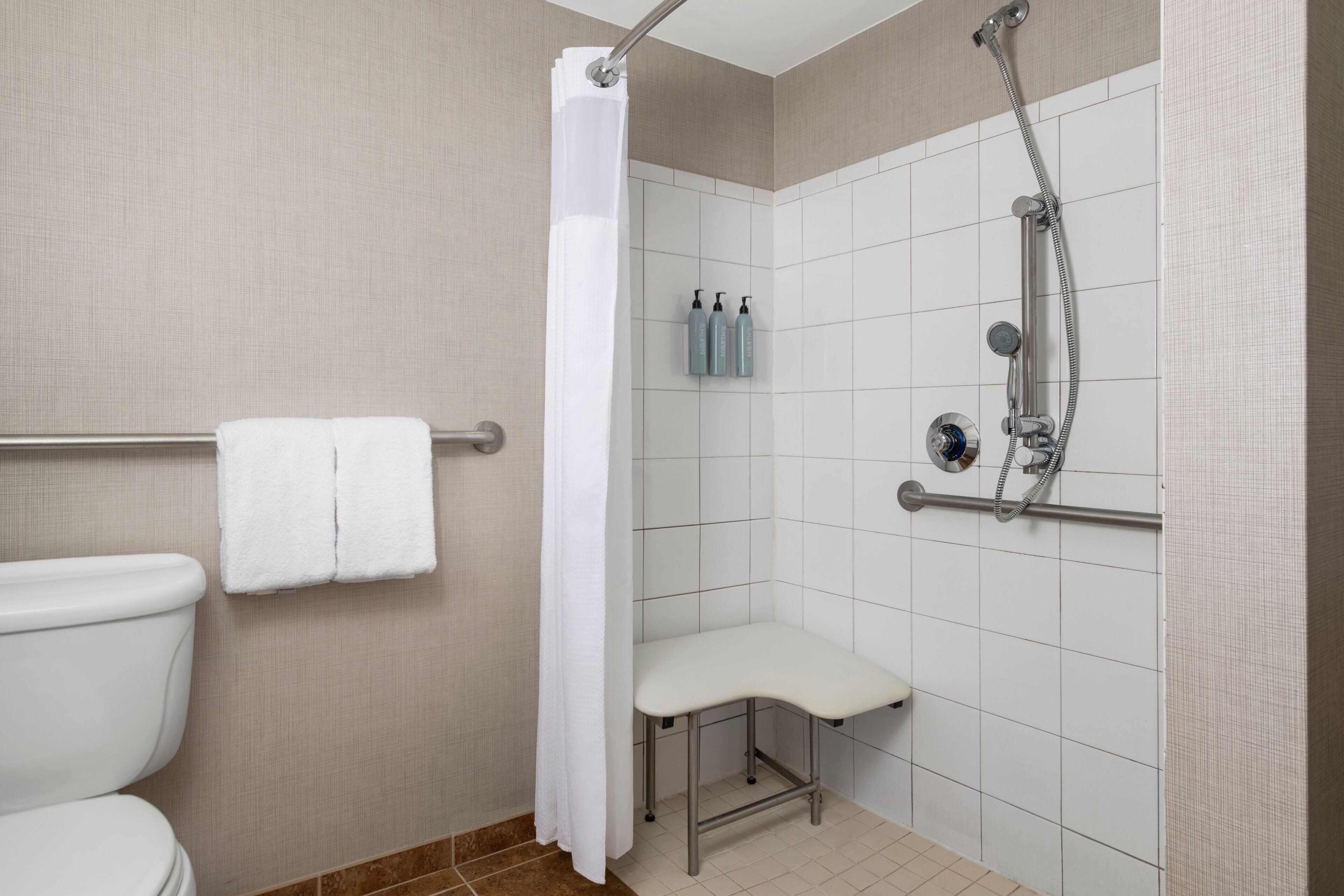 combined shower/bathtub, free toiletries, hair dryer, towels