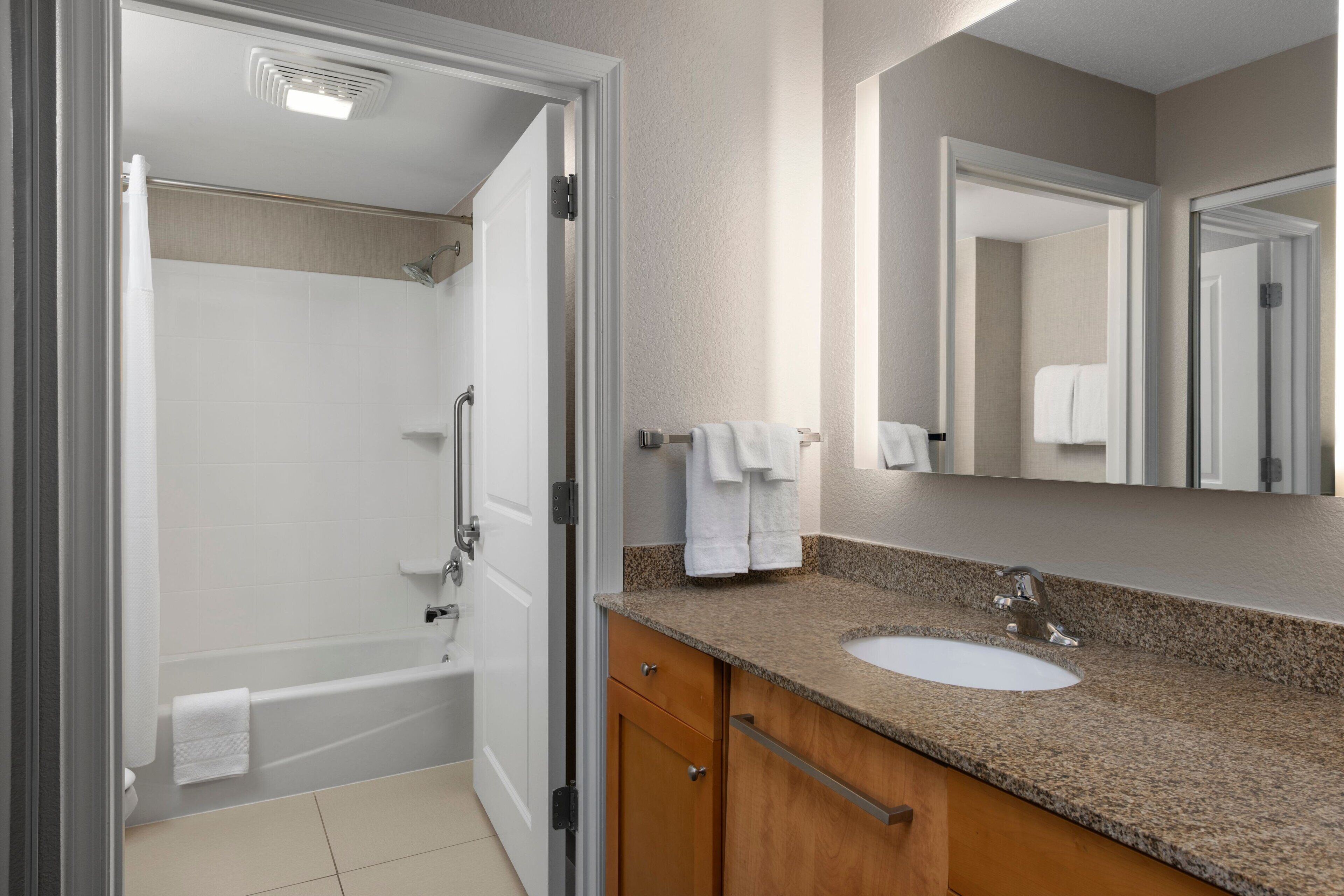 combined shower/bathtub, free toiletries, hair dryer, towels