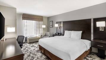 Desk, laptop workspace, blackout drapes, iron/ironing board