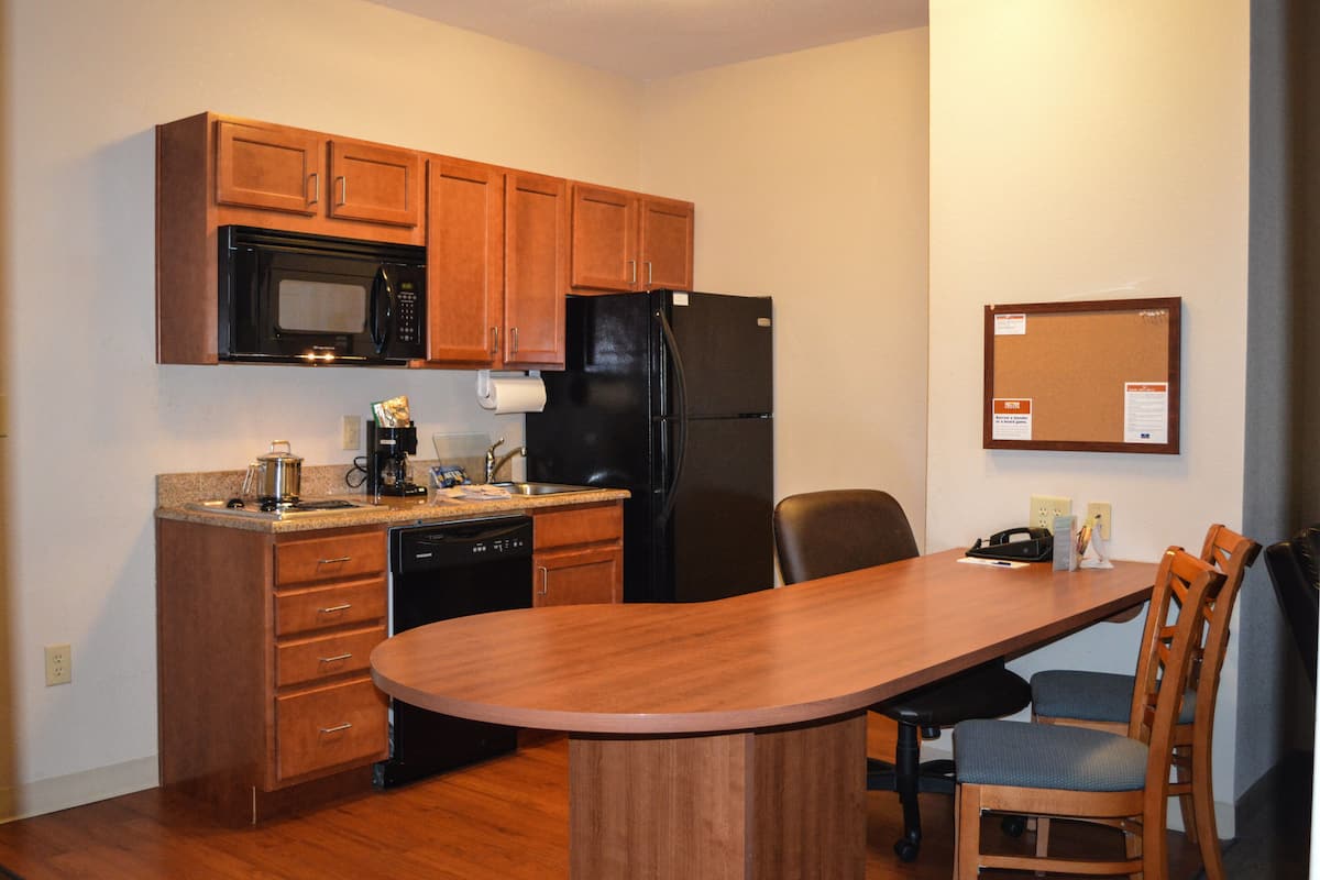 premium bedding, desk, laptop workspace, blackout curtains