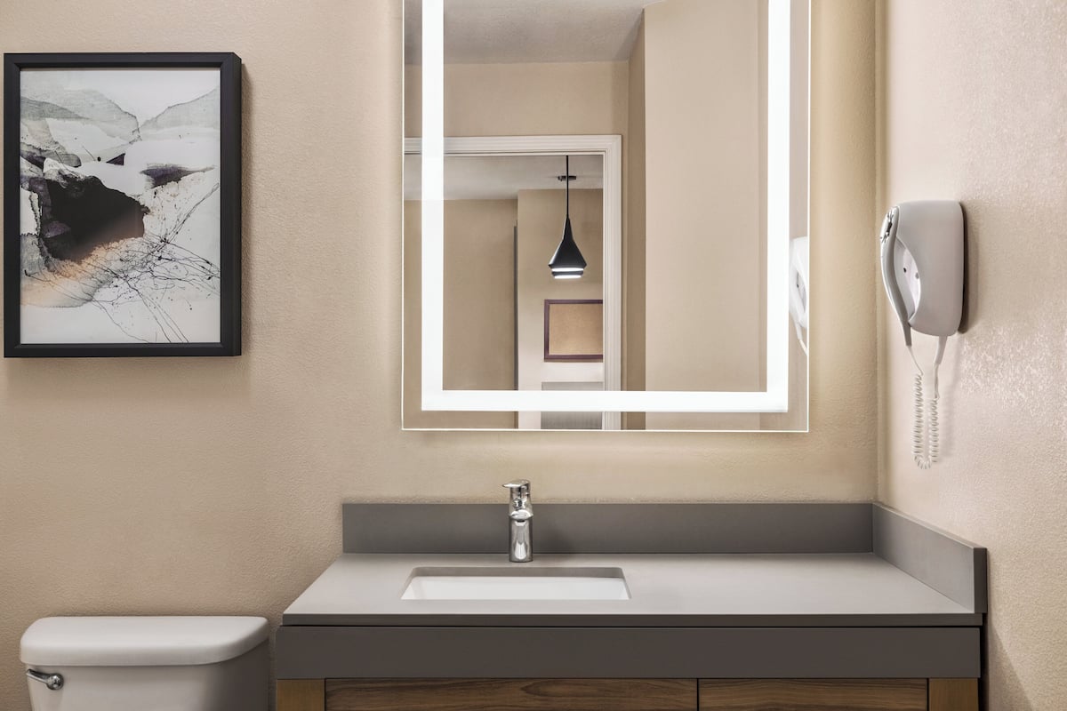 studio suite, 1 queen bed | premium bedding, desk, laptop workspace, blackout curtains