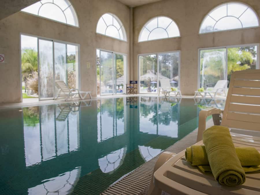 Indoor pool, outdoor pool, pool umbrellas