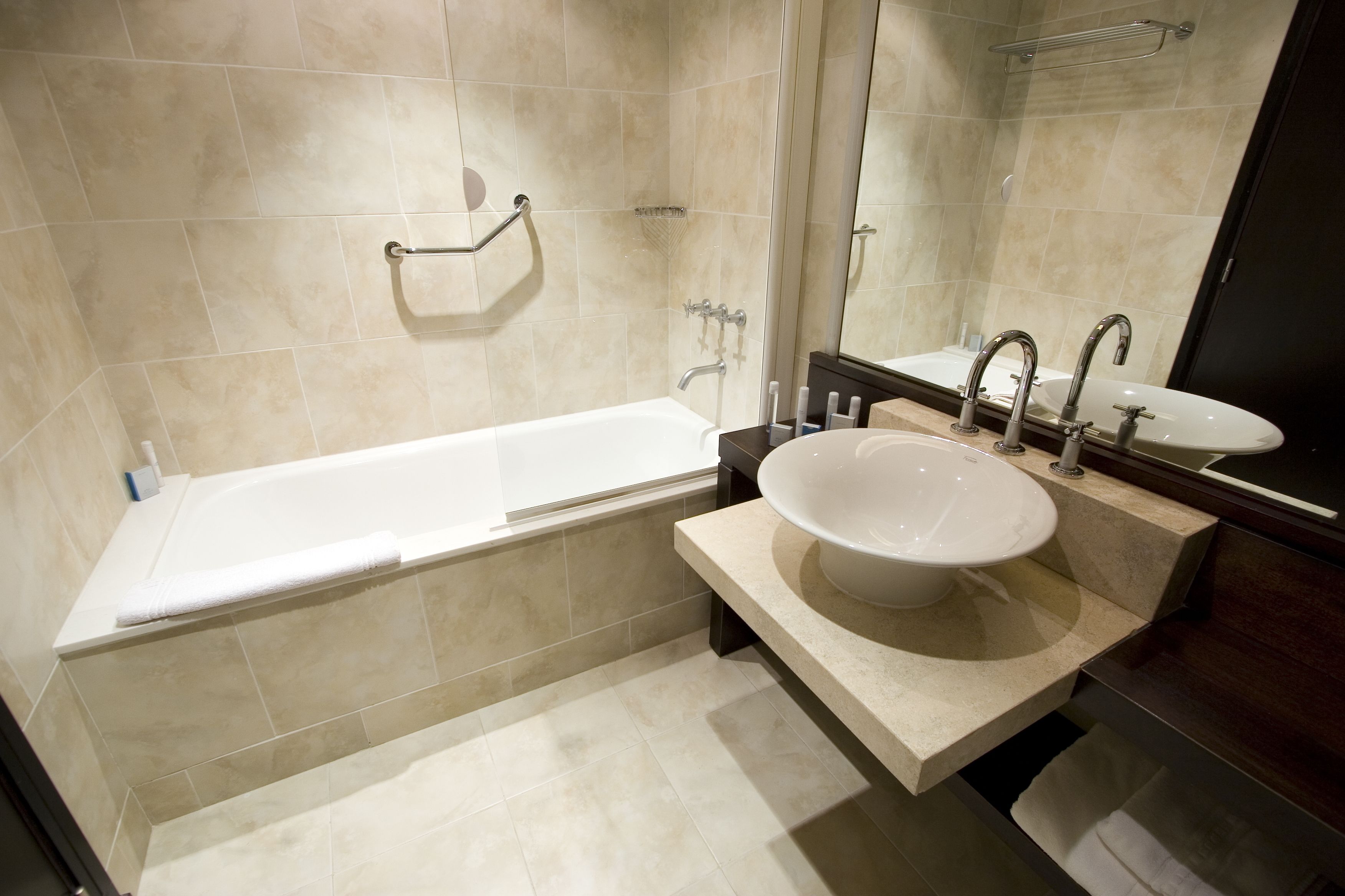 combined shower/bathtub, deep-soaking bathtub, rainfall showerhead