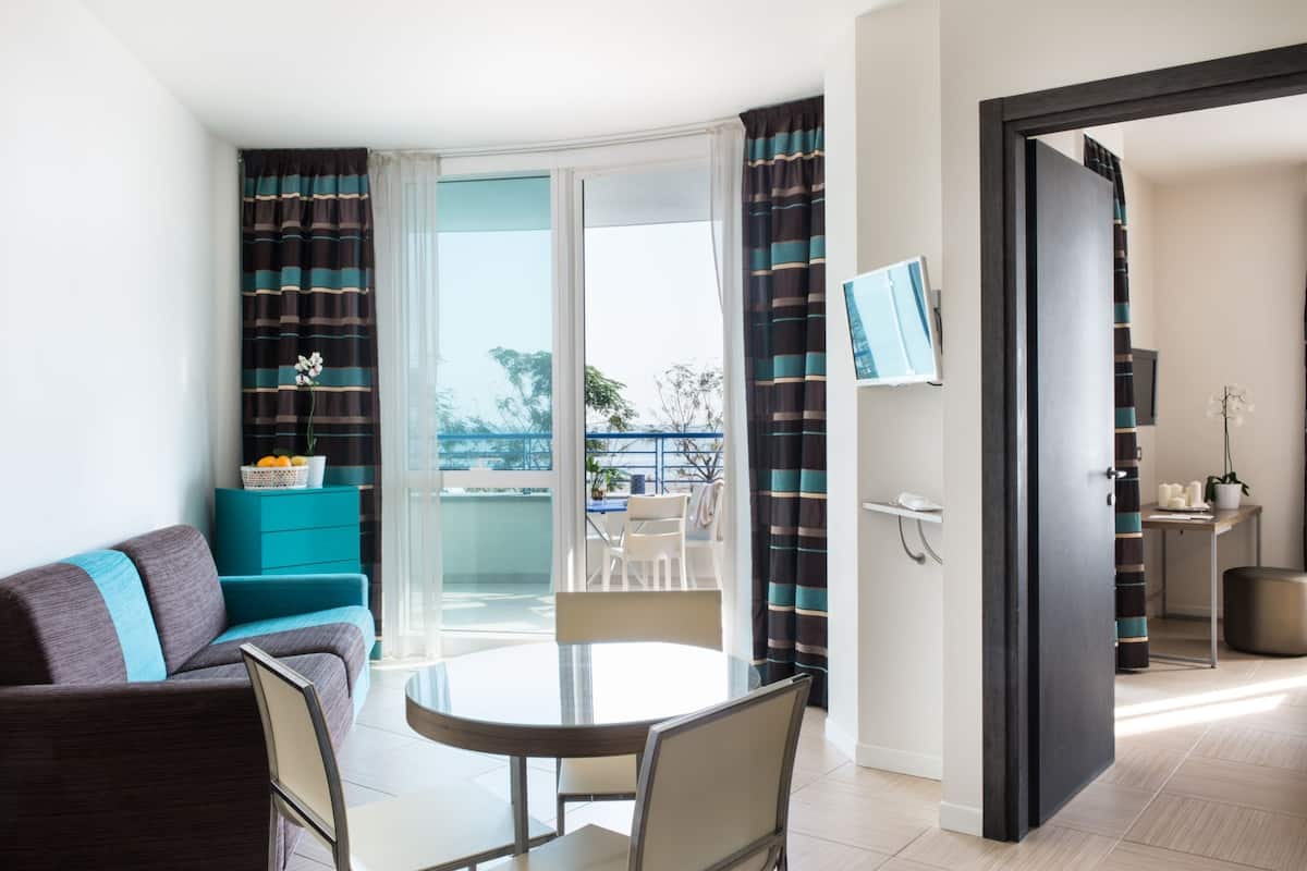 Suite (Wellness Access and Beach Amenities) | Premium bedding, minibar, in-room safe, desk