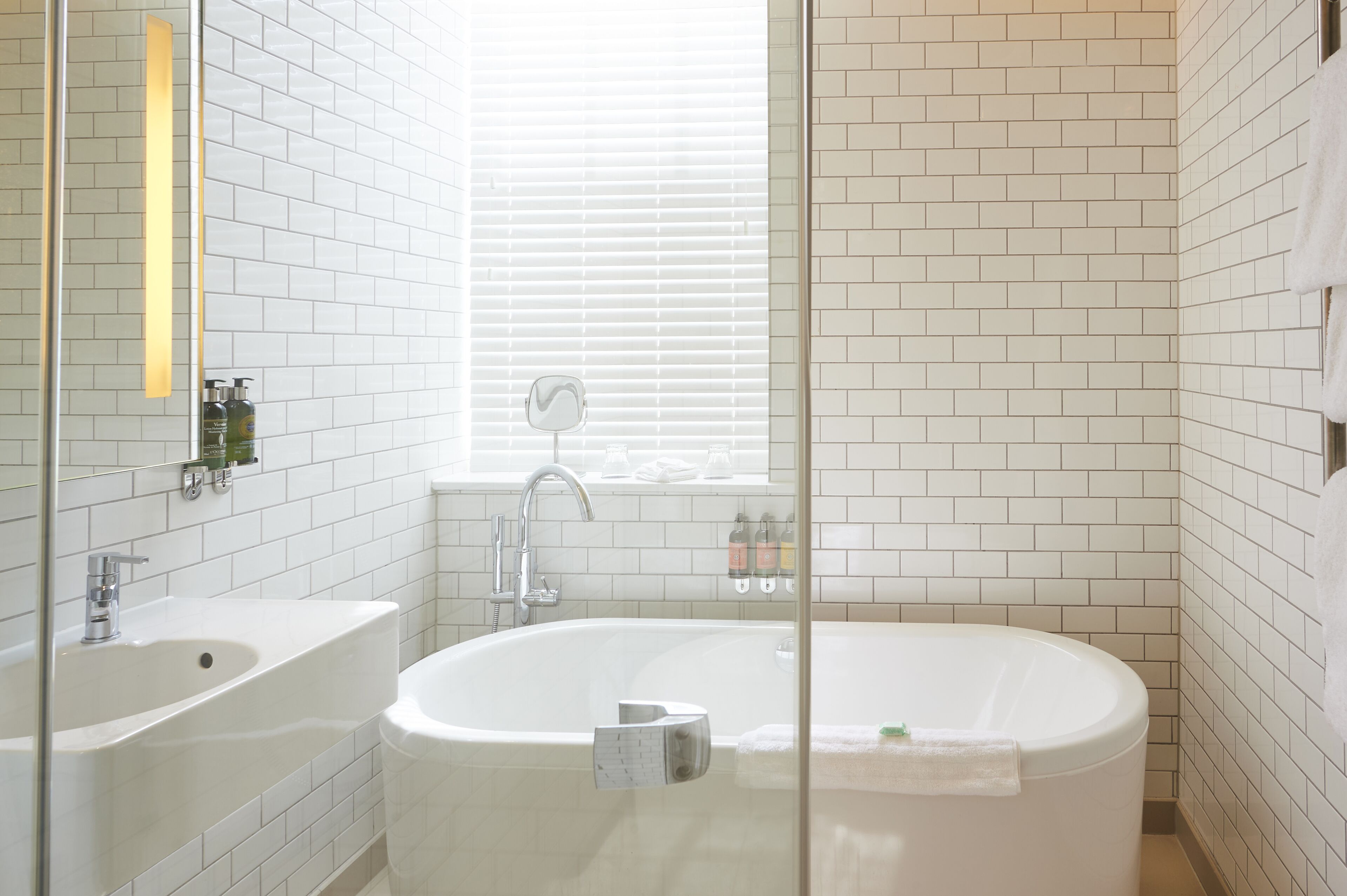 deluxe room | bathroom | free toiletries, hair dryer, towels, soap