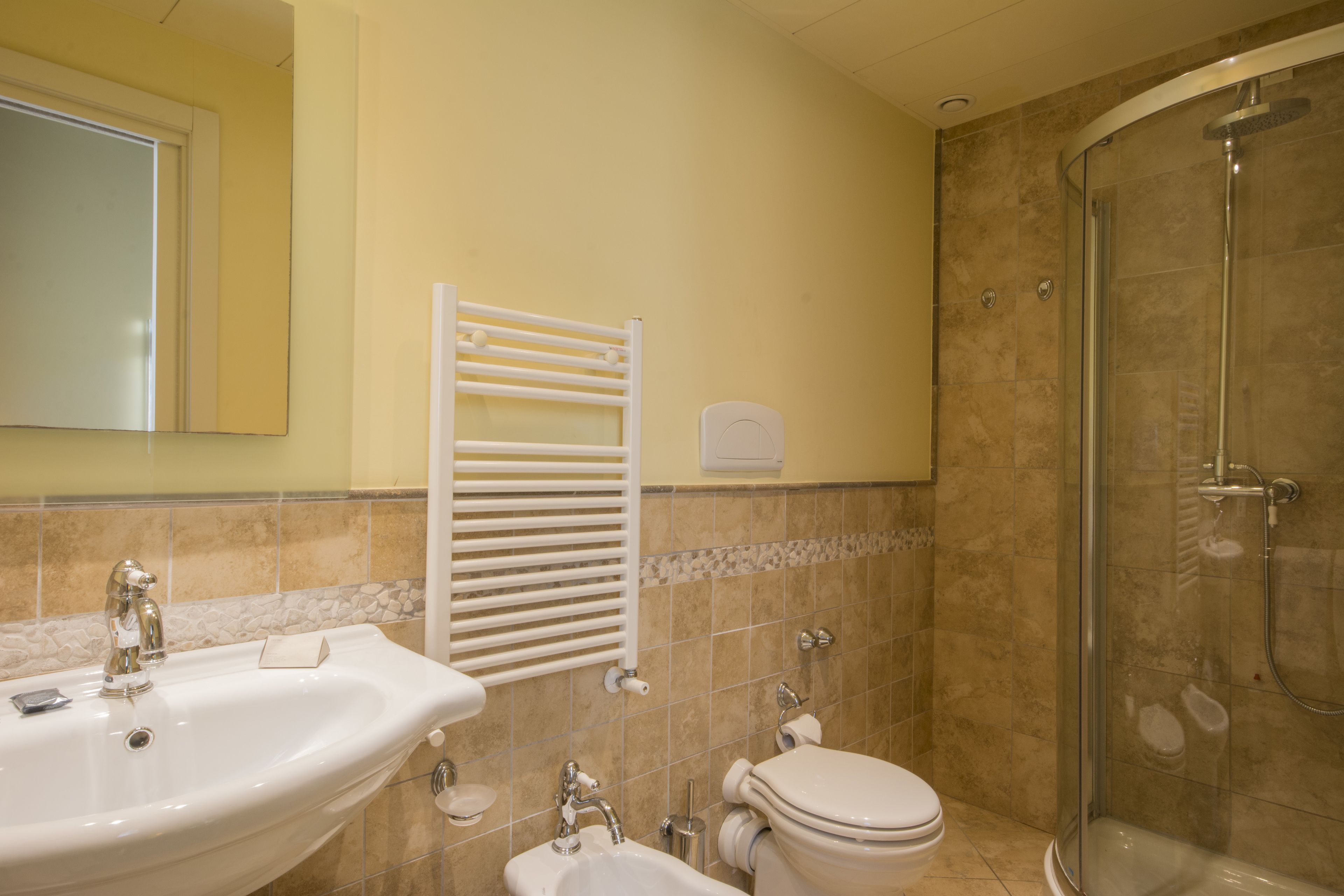 free toiletries, hair dryer, bidet, towels