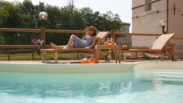Outdoor pool, pool umbrellas, pool loungers