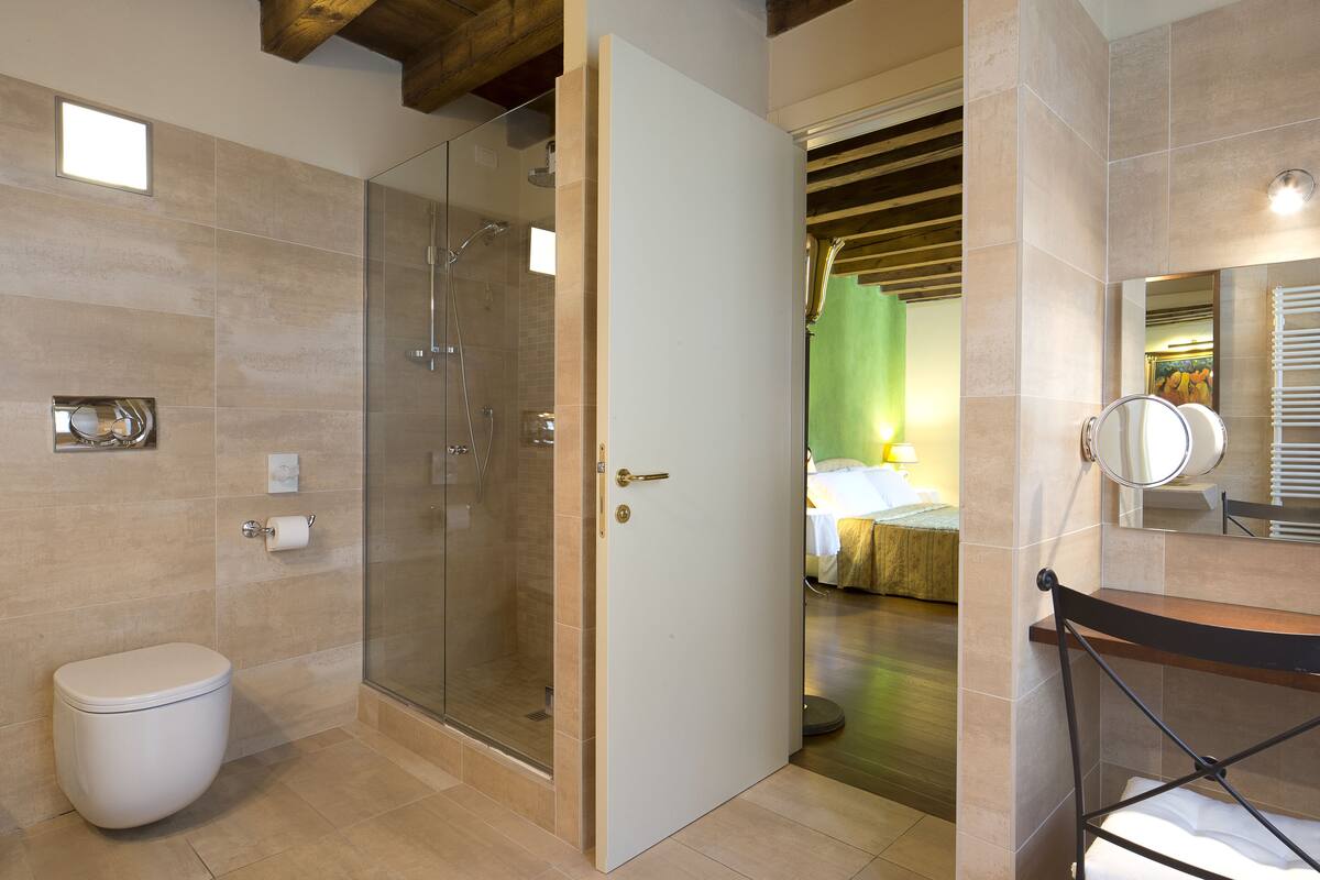 shower, rainfall showerhead, designer toiletries, hair dryer