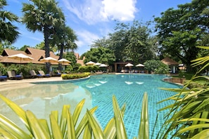 Outdoor pool, open 6:00 AM to 7:00 PM, pool umbrellas, pool loungers