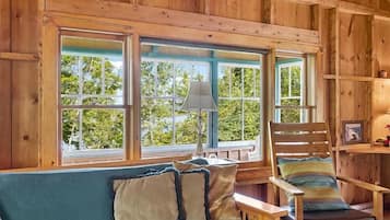 Traditional Cabin, 3 Bedrooms, Oceanfront | Living area | 50-inch Smart TV with cable channels, streaming services