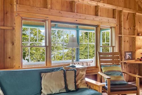 Traditional Cabin, 3 Bedrooms, Oceanfront | Living area | 50-inch Smart TV with cable channels, streaming services