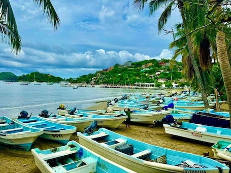 Una playa cerca, toallas de playa
