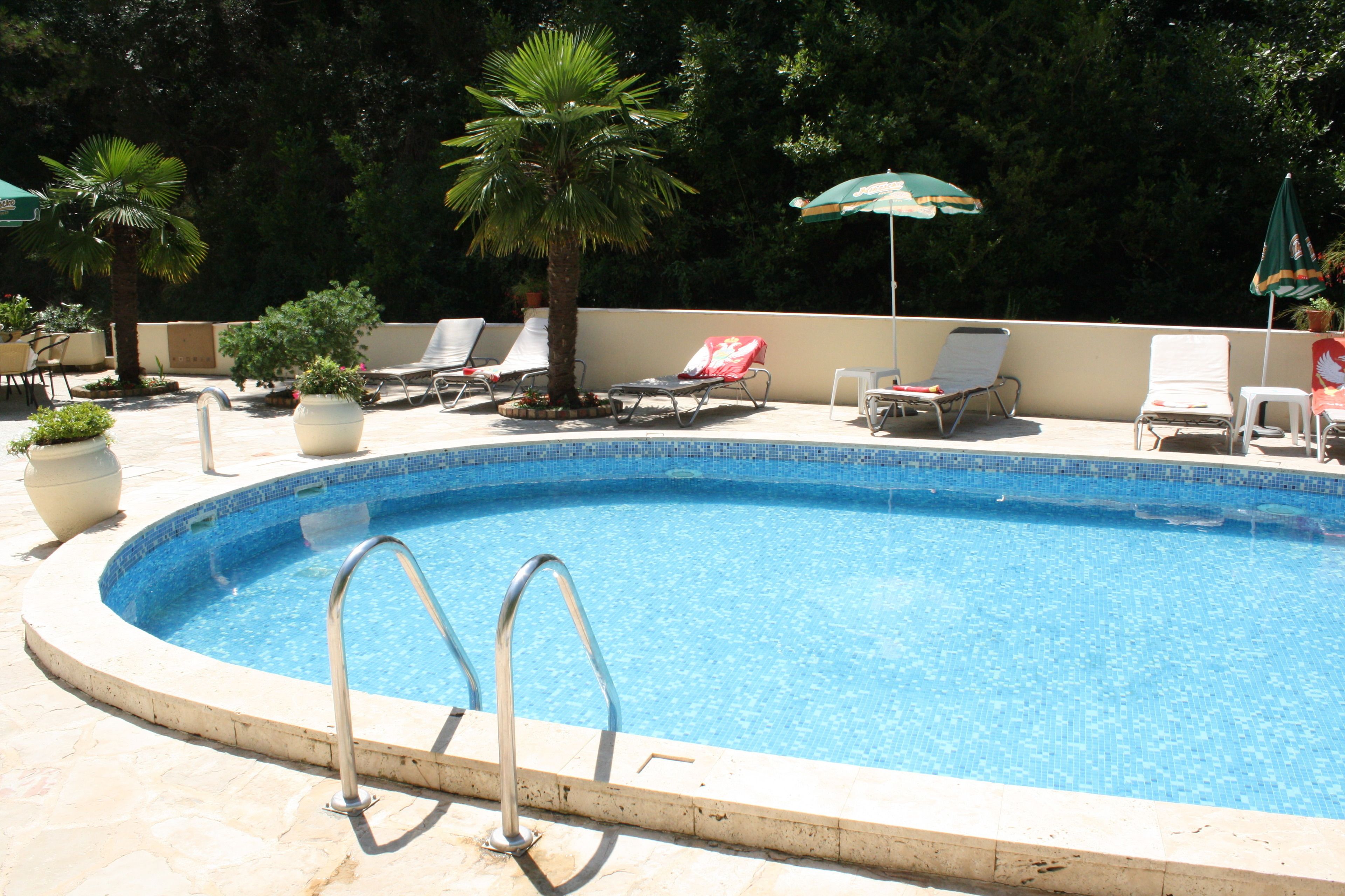 outdoor pool, pool loungers