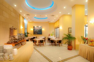 Daily buffet breakfast (EUR 14 per person)