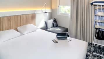 Premium bedding, desk, blackout drapes, soundproofing