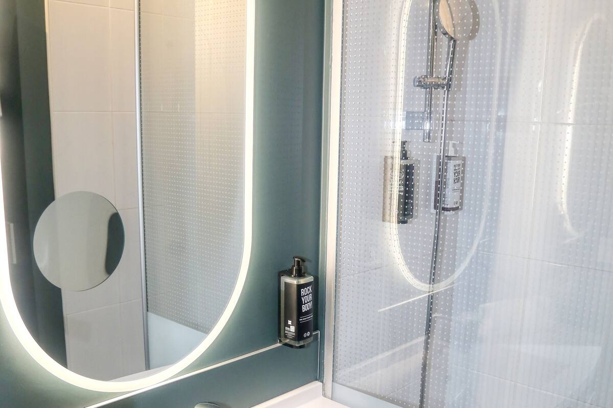 shower, eco-friendly toiletries, hair dryer, towels