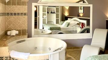 Romantic Suite, 1 Bedroom, Hot Tub | Premium bedding, minibar, in-room safe, individually decorated