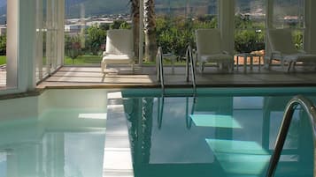 Indoor pool, open 8:00 AM to 8:00 PM, sun loungers