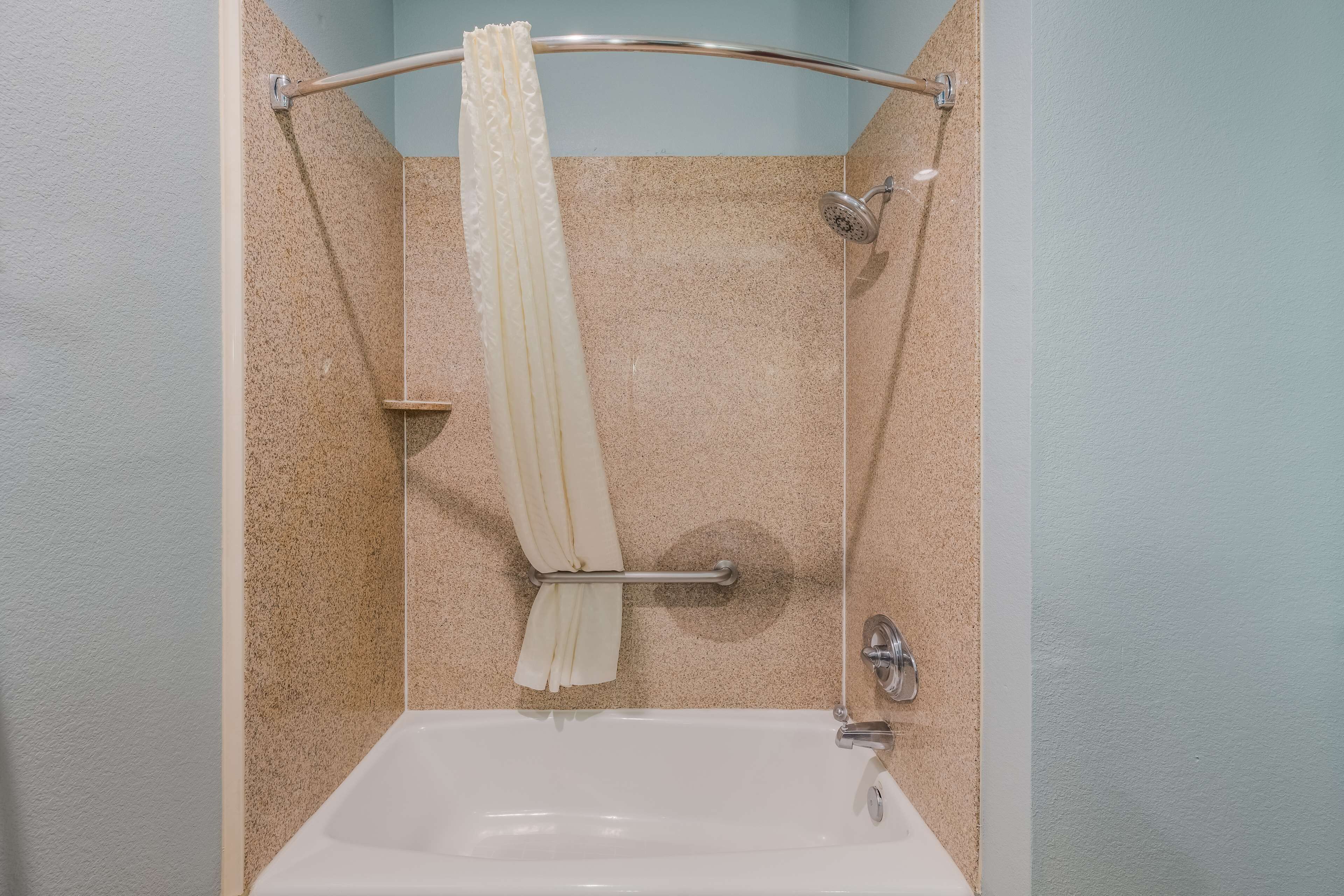 combined shower/bathtub, free toiletries, hair dryer, towels