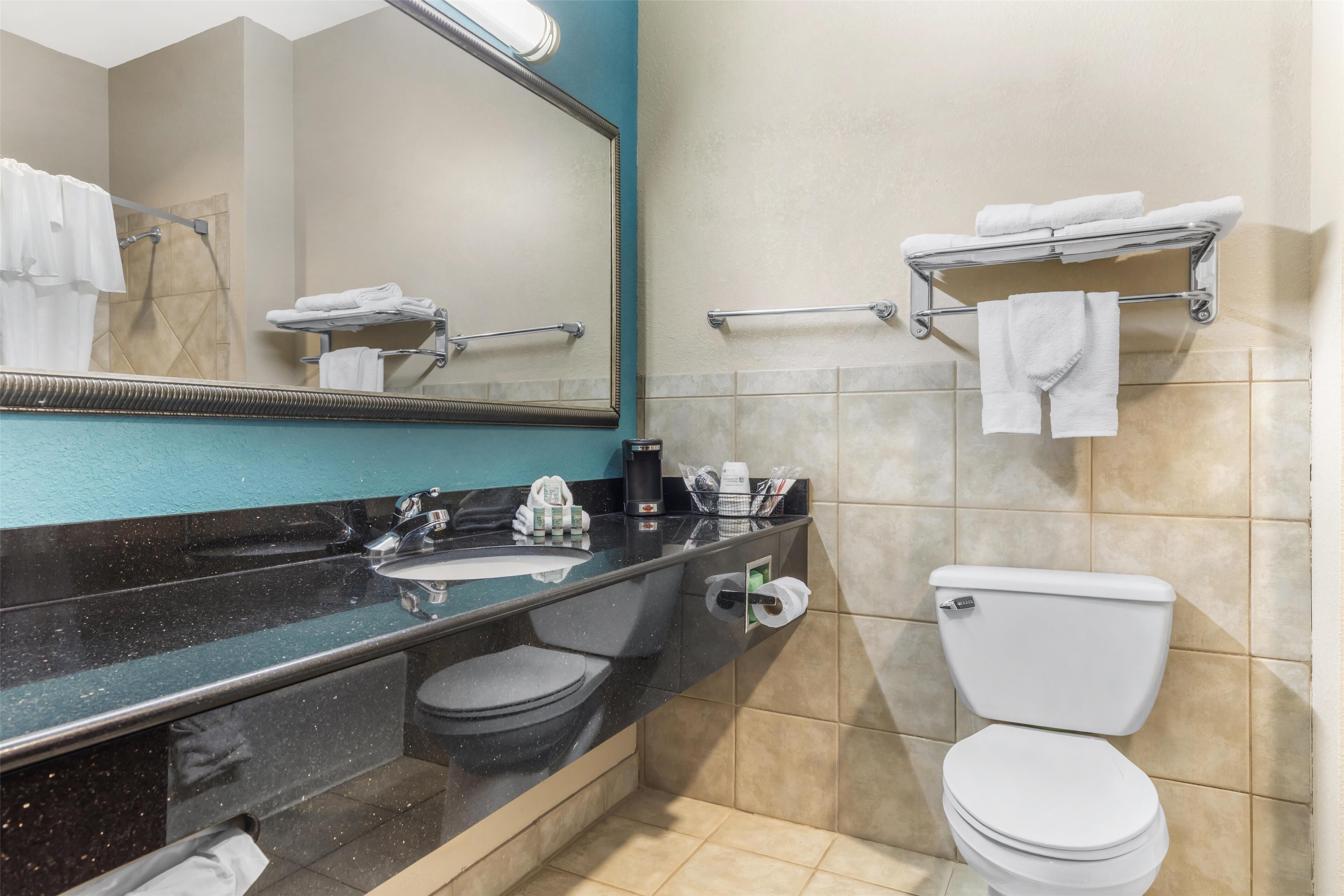 standard room, 2 queen beds, non smoking, refrigerator & microwave | bathroom | free toiletries, hair dryer, towels, toilet paper