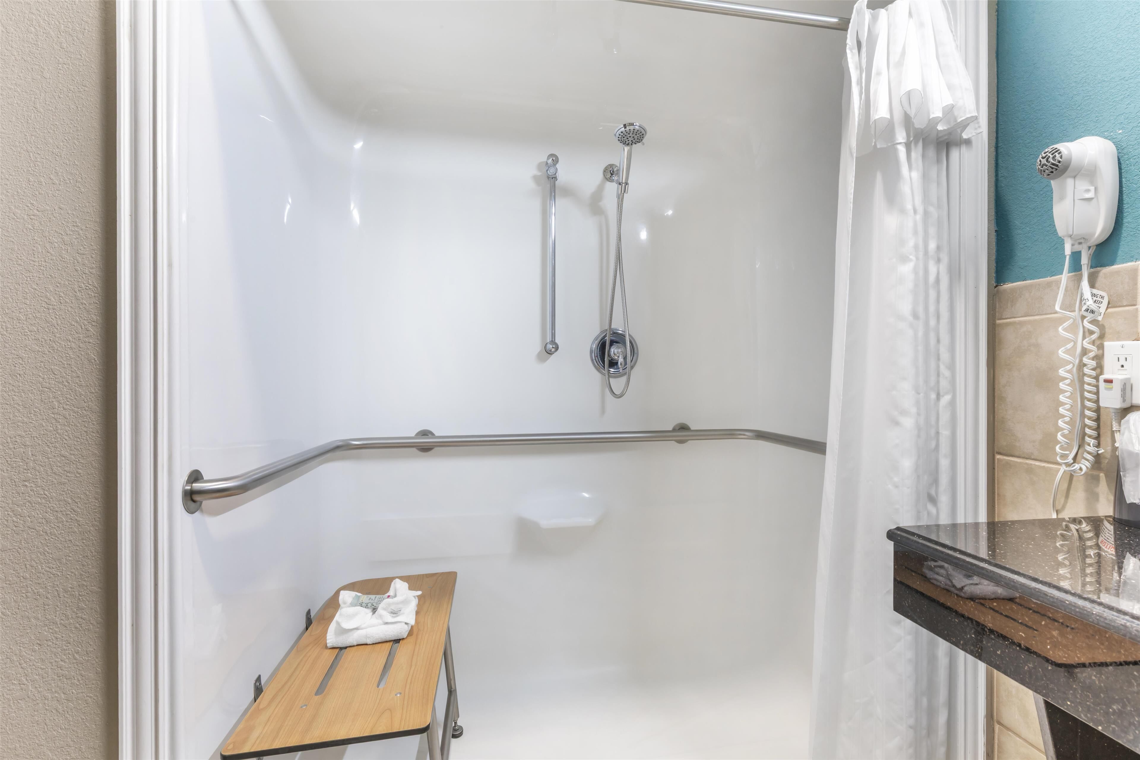 suite, 1 king bed, accessible, jetted tub | bathroom | free toiletries, hair dryer, towels, toilet paper