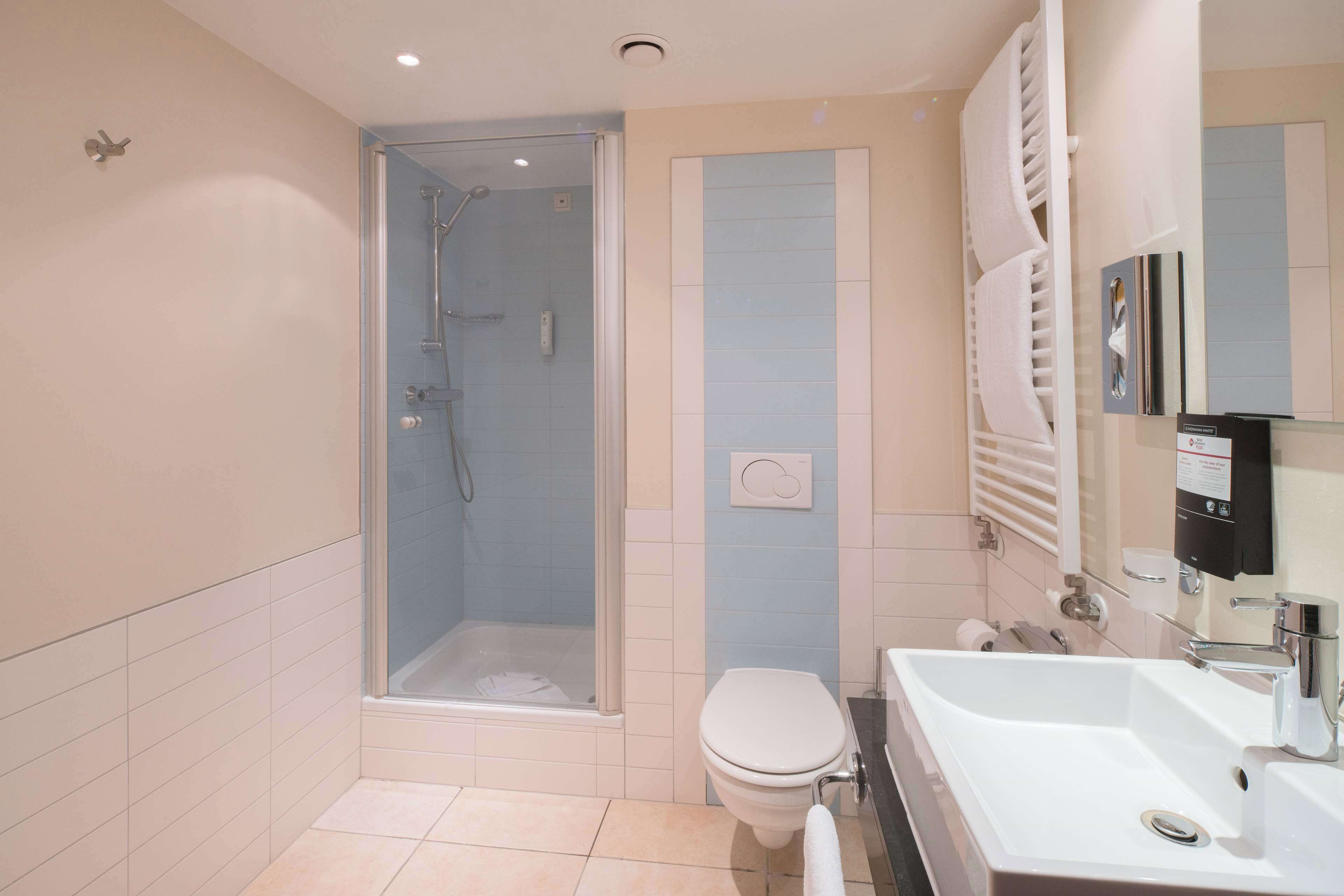 shower, free toiletries, hair dryer, slippers