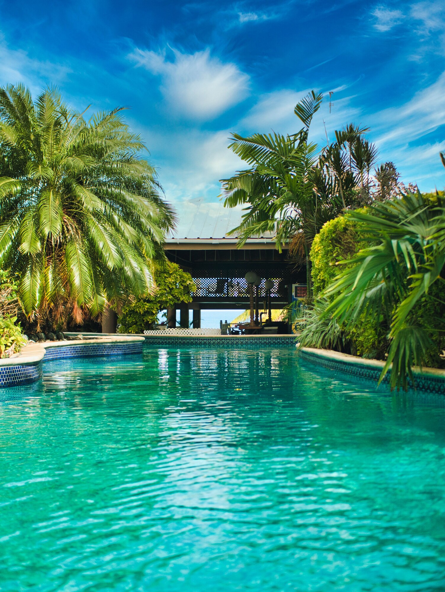 2 outdoor pools, open 8:00 AM to 7:30 PM, pool loungers