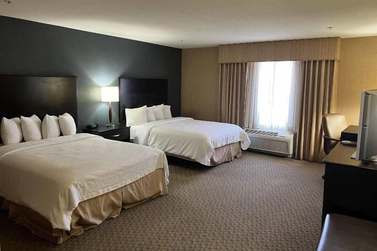 Down comforters, pillowtop beds, desk, blackout drapes