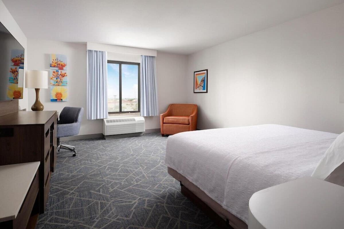 Hypo-allergenic bedding, in-room safe, blackout drapes