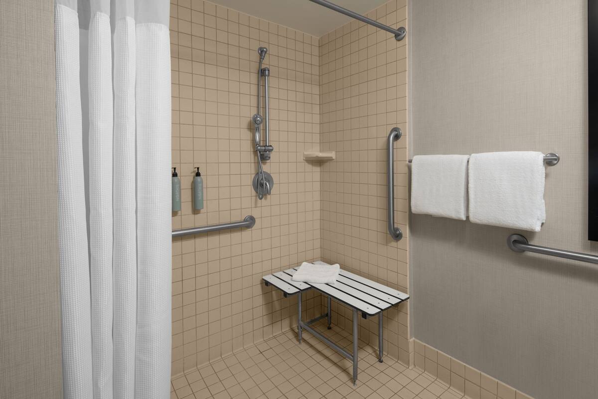 combined shower/bathtub, free toiletries, hair dryer, towels