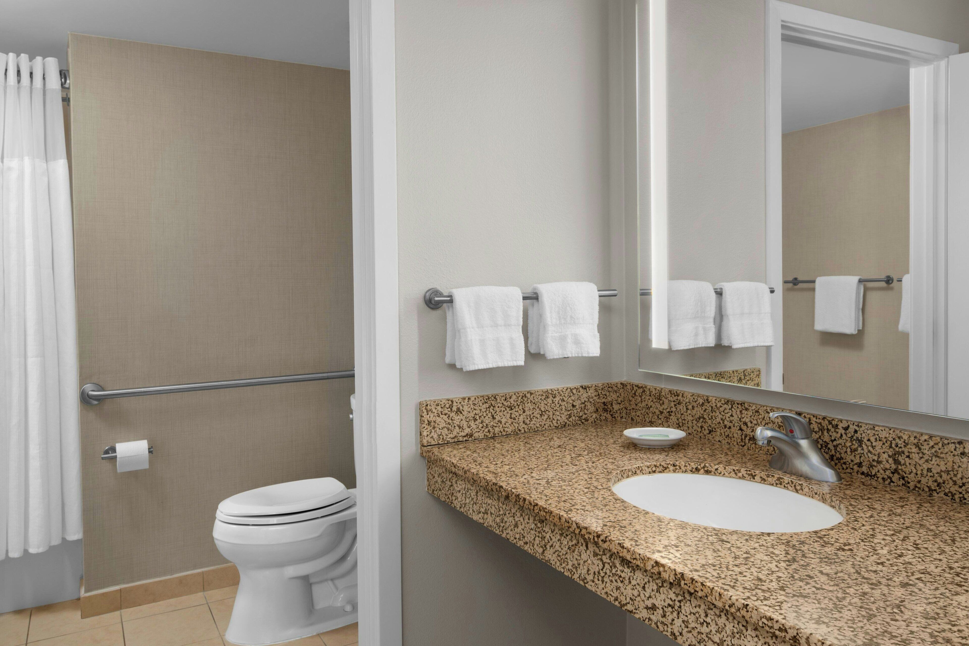 combined shower/bathtub, free toiletries, hair dryer, towels